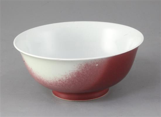 A Chinese peach-bloom bowl, 18th century, 18.2cm diameter, small firing fault inside foot